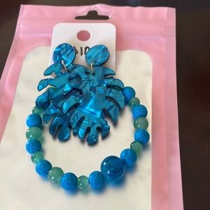 Bracelets with earrings.